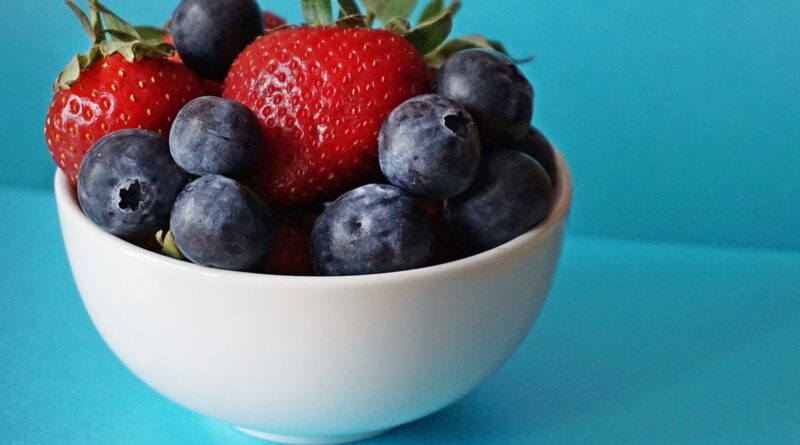 Blueberries and Strawberries in White Ceramic Bowl